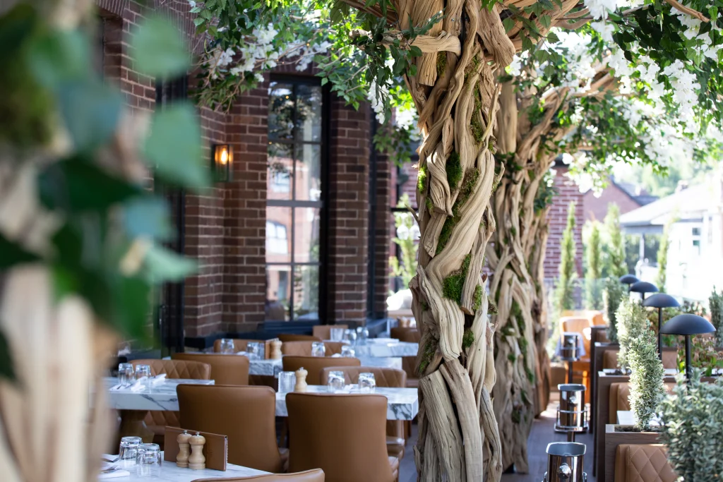 Custom made tree trunk by I Want Plants