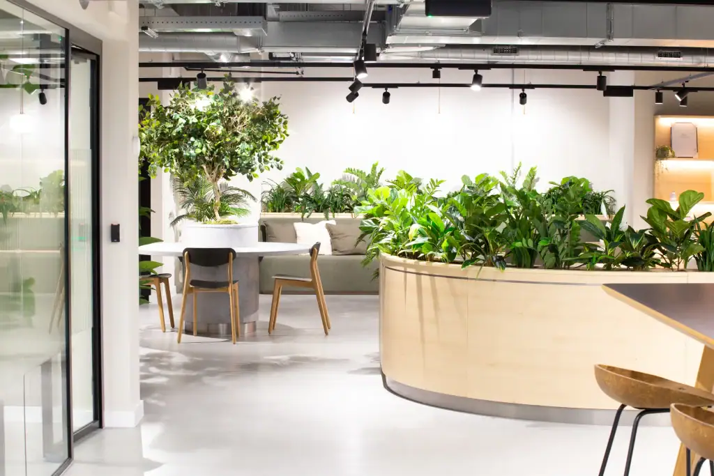 Replica plants planted into curved trough and floor standing