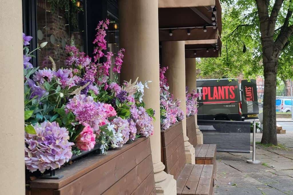 I Want Plants installing a bespoke floral design at All Bar One in Chester