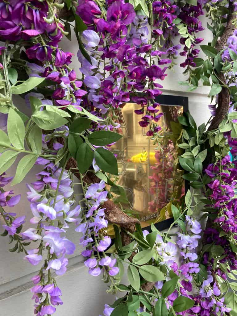 All Bar One artificial wisteria around entrance sign