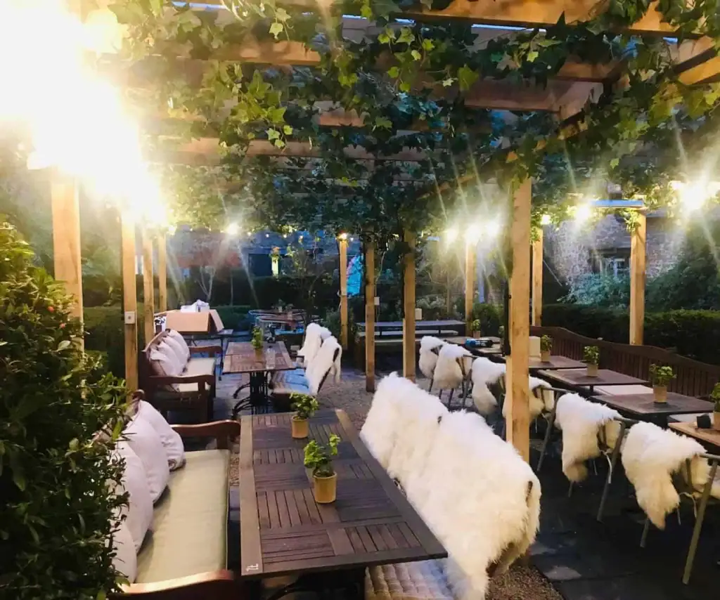Pergola dressed with replica ivy garlands for Butcombe Brewing Co, Bristol