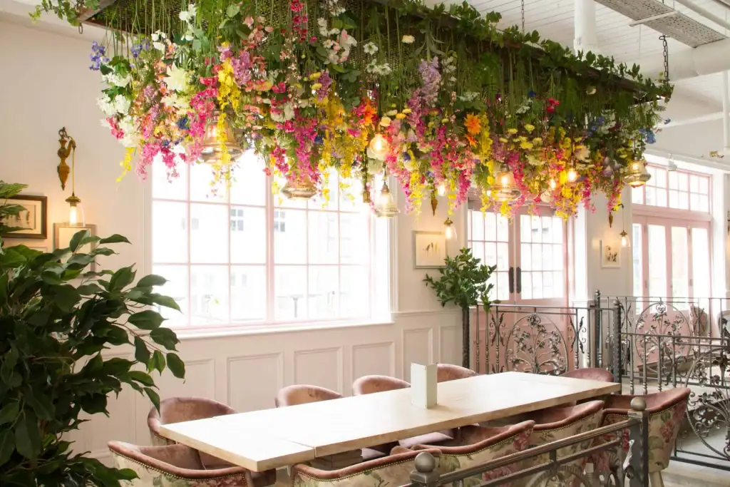 Raft of artificial hanging flowers for The Florist