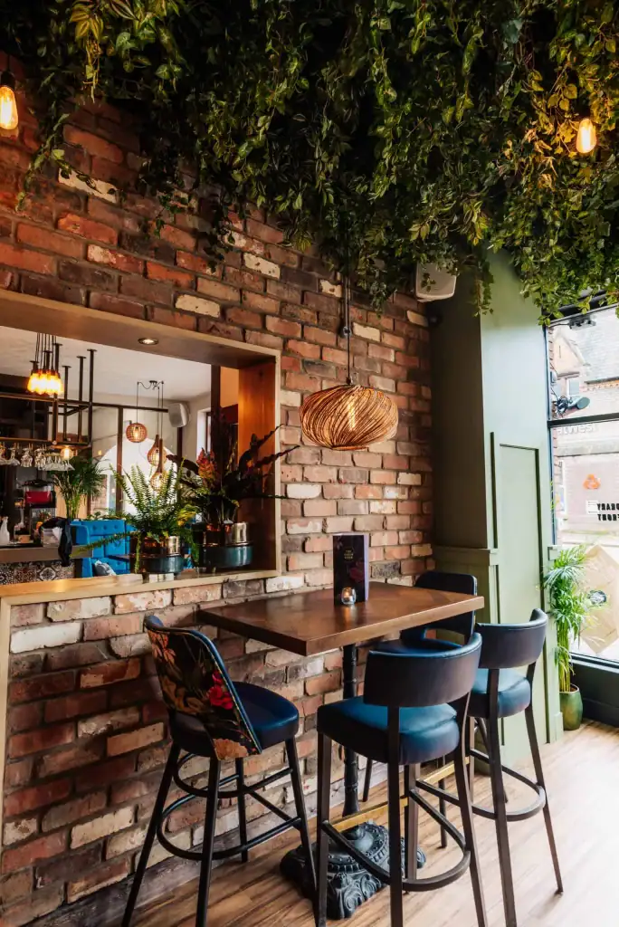 Artificial foliage within the custom planting scheme at The Green Room
