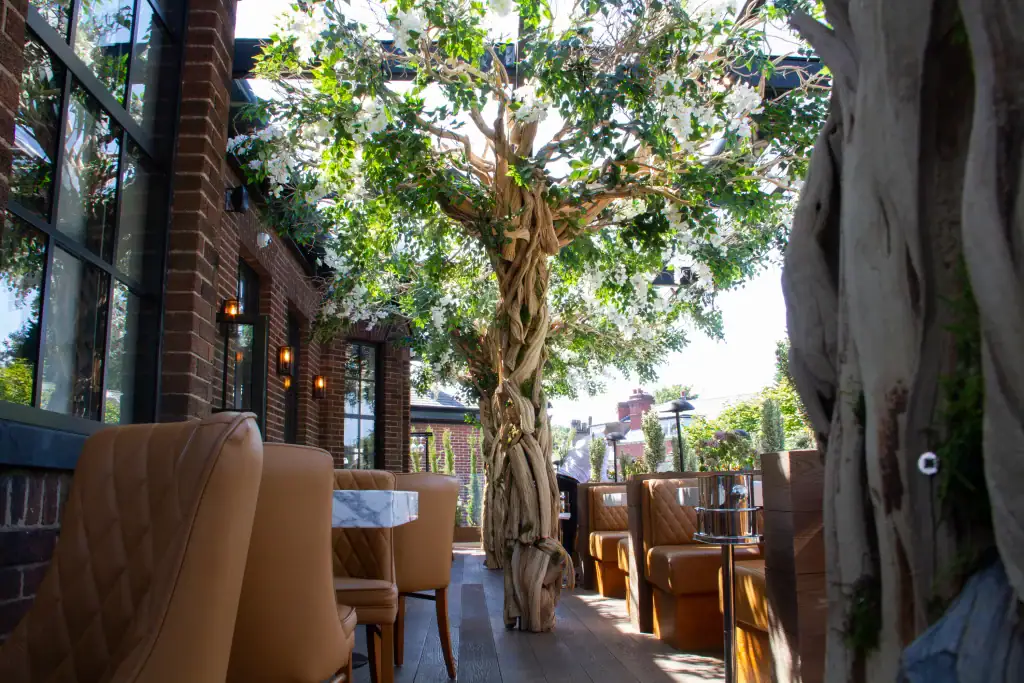 custom made blossom trees on first floor terrace at Cibo Hale