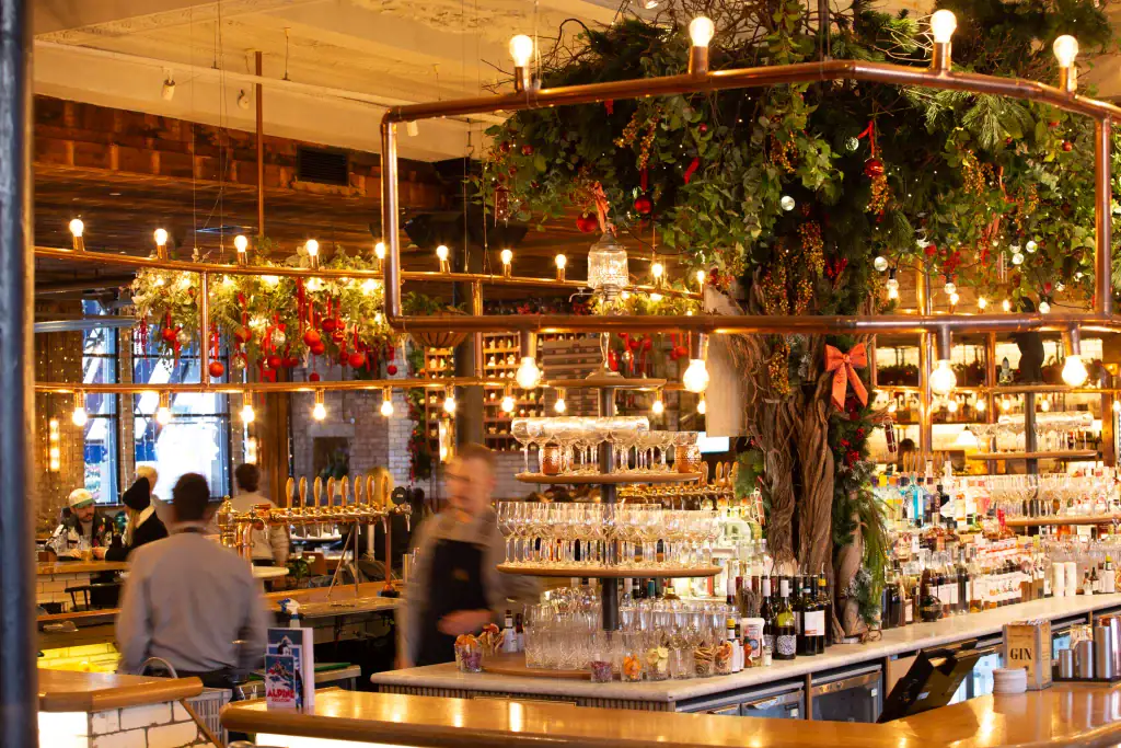 custom made festive tree within Alberts schloss bar area by i want plants