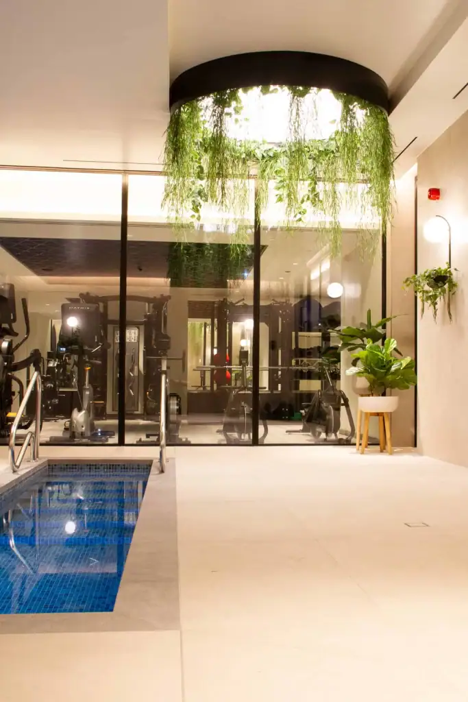 Artificial foliage attached to suspended hoop from ceiling at Oxygen Manchester