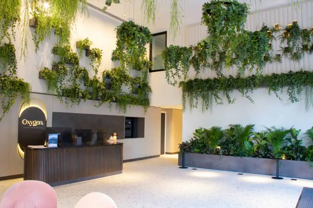 Live and artificial plant displays in troughs, wall mounted and ceiling suspended by I Want Plants