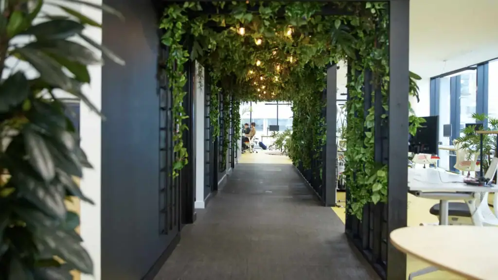 Trellis tunnel of artificial Pothos vines, Lyrata and broad leaves for Peak A.I.