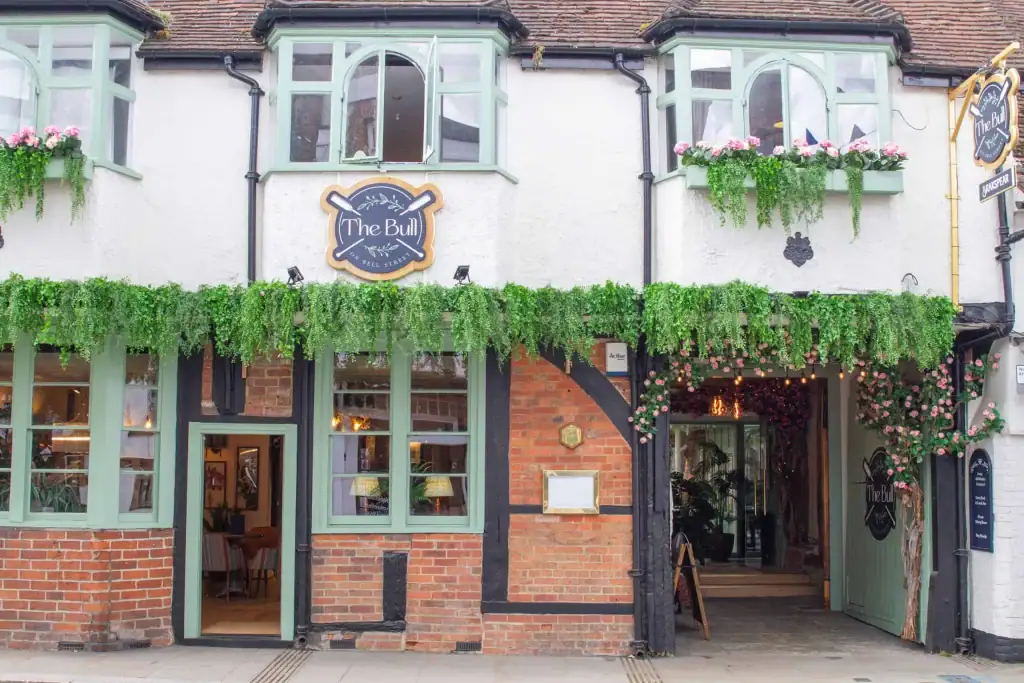 Front elevation at The Bull in Henley with artificial trailing greenery and custom made blossom tree