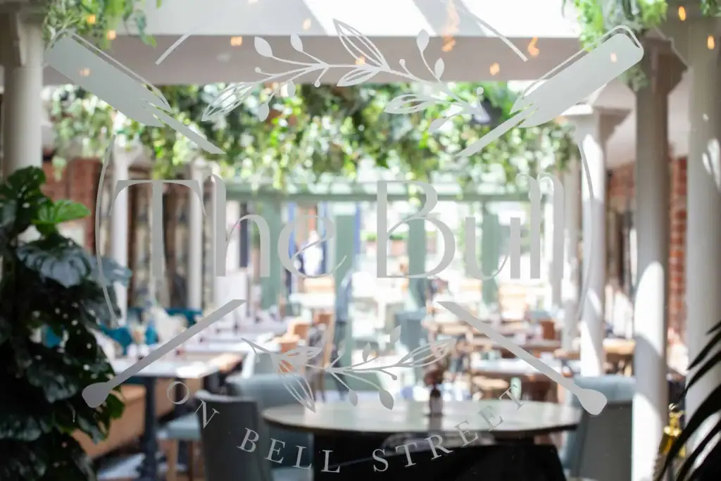 TheBull Henley dining area with ceiling suspended ivy foliage by I Want Plants