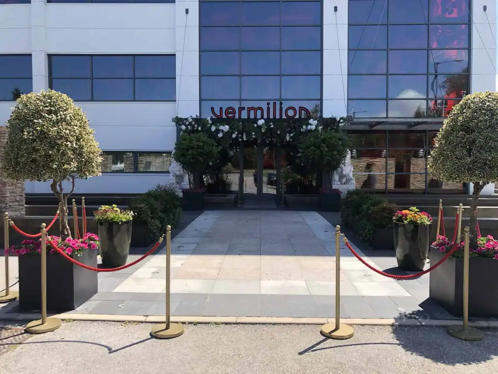 Manzanita with UV grade artificial Ferns, Bamboo, Ficus, Eucalyptus and white Hydrangea, purple Clematis and Anenomes at the entrance of Vermillion