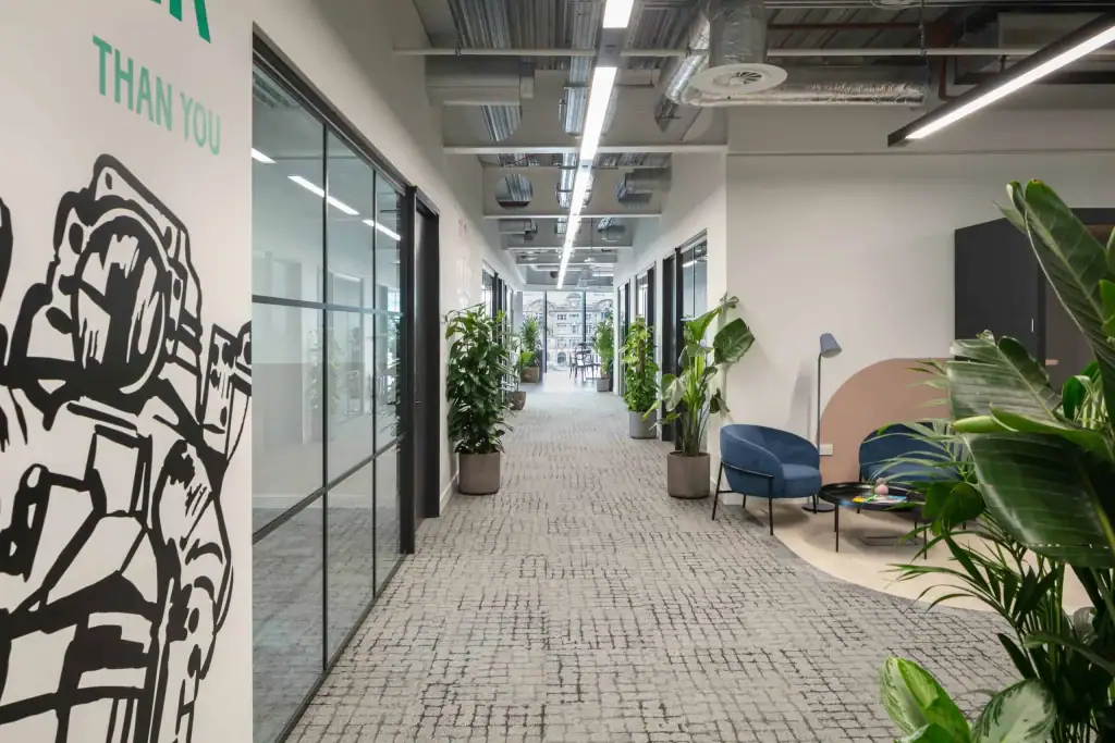 x and y manchester workspace corridor with live planting scheme by I want plants
