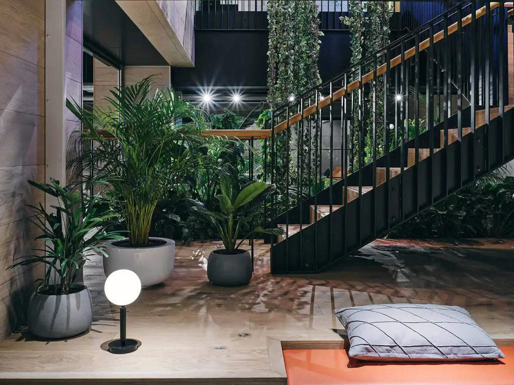 Bloc Basement with live plants in round grey planters