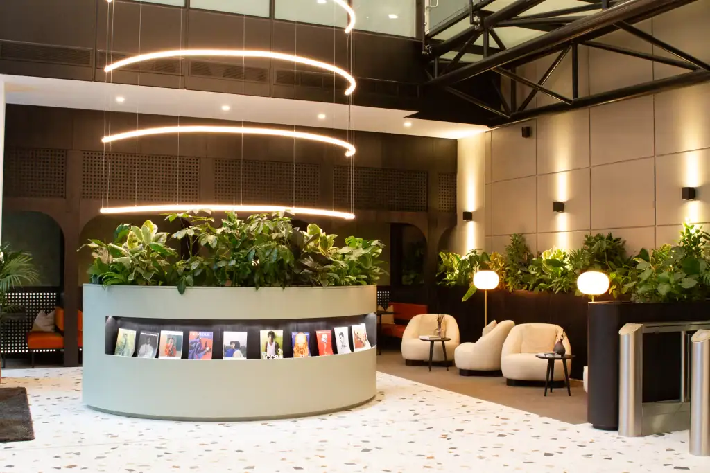 Workspace planting scheme at 5 St Paul's Square featuring broad leaf varieties in a curved planter