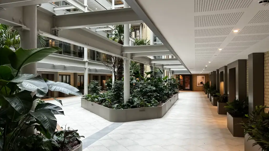 Communal atrium with live planting displays at Horlicks Quarter