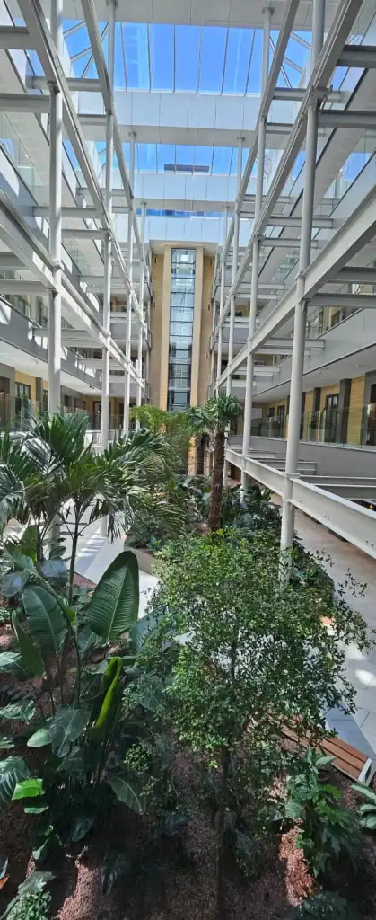 Communal atrium with live planting displays at Horlicks Quarter