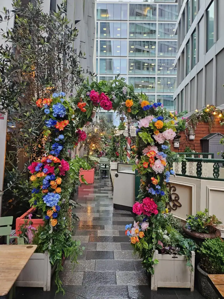 artificial floral arch by I want plants