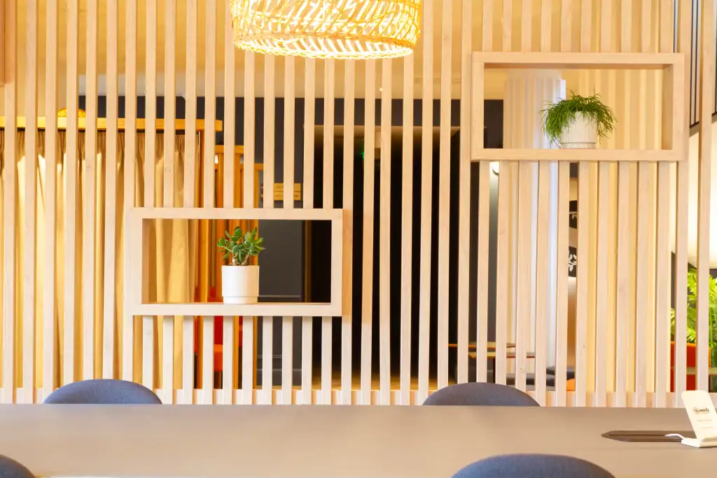 open plan wood panelling with shelf space for live plant feature