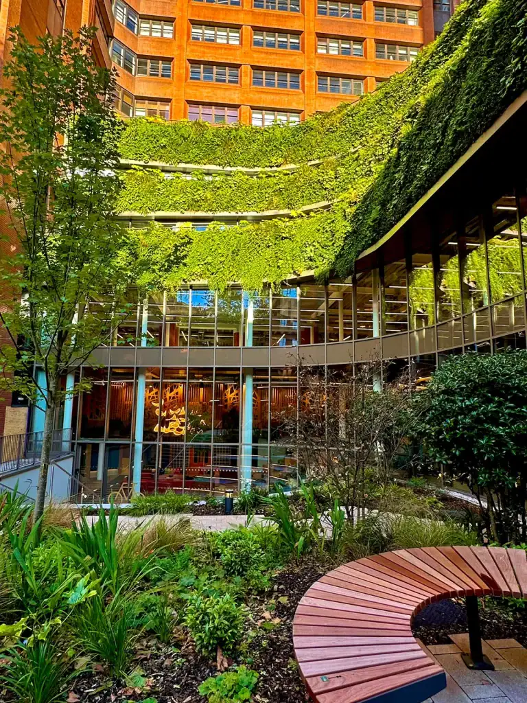 HYVERT living wall and landscaped entrance to West Village Leeds in bright sunshine