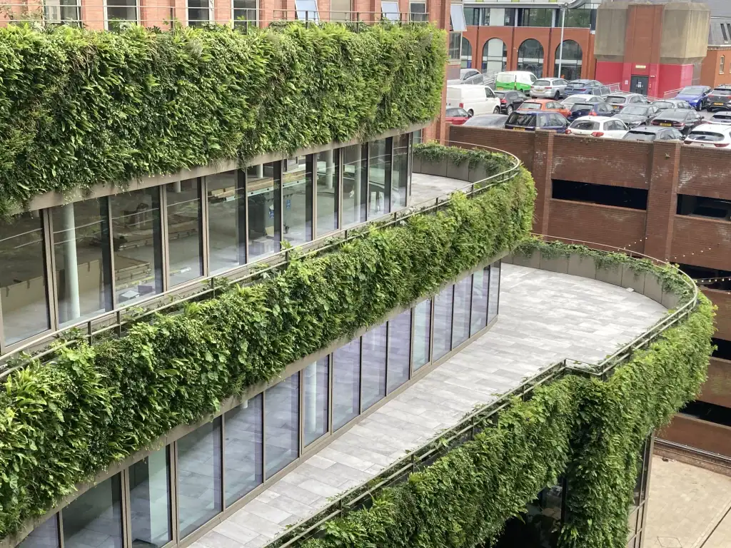 Curved, tiered living wall called HYVERT invented by I Want Plants