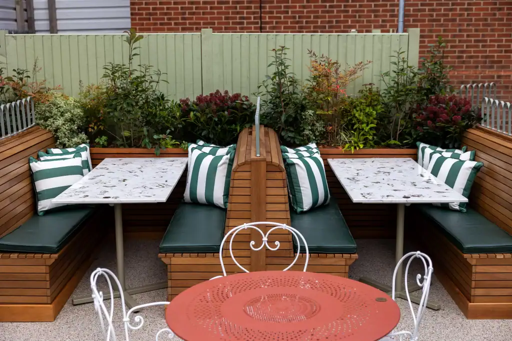 outside terrace seating with live plant display by I Want Plants