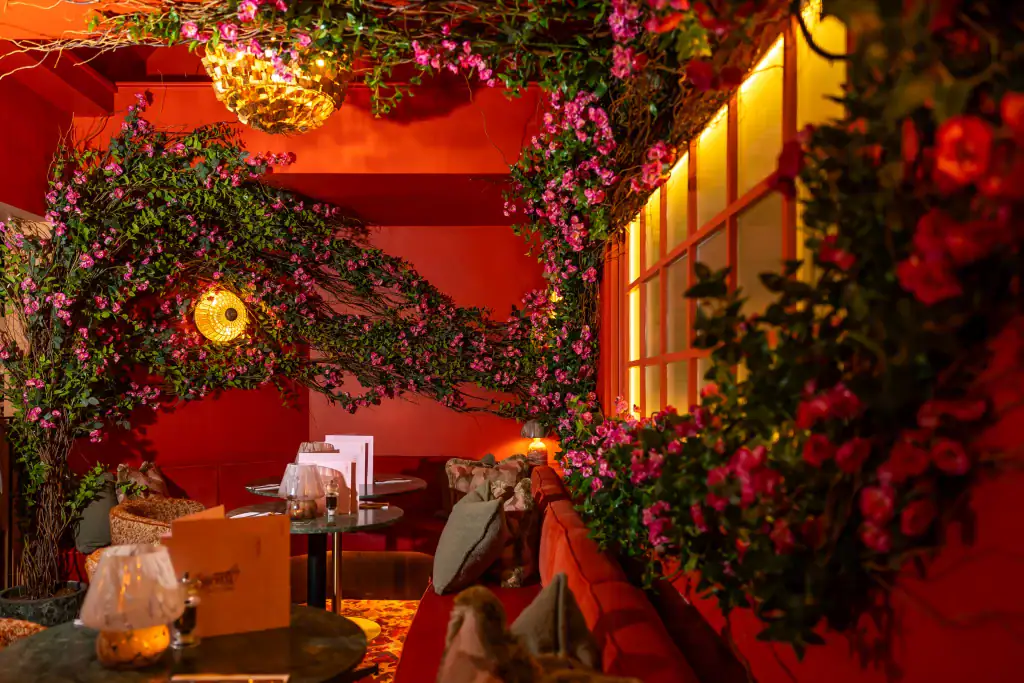 Wall mounted artificial foliage and flowers custom installation by I Want Plants