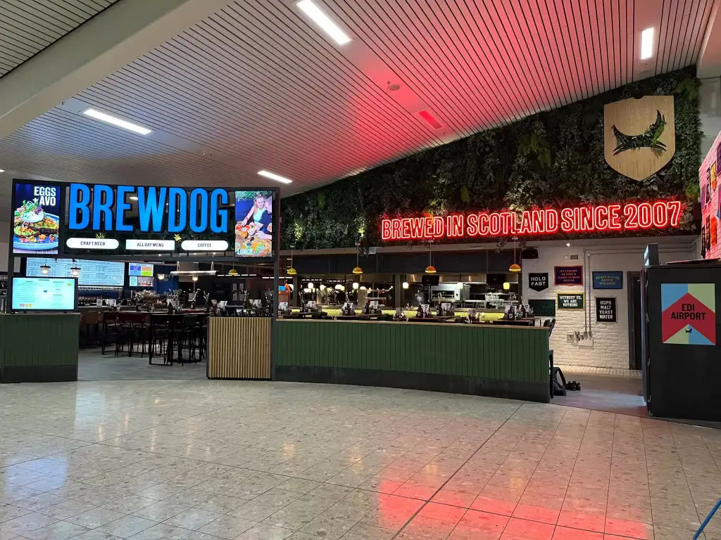 Brewdog Edinburgh Airport green wall