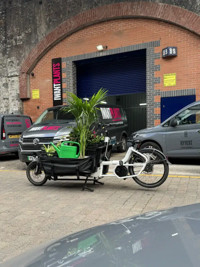 Title IWP Manchester Service Hub and electric cargo bike Caption