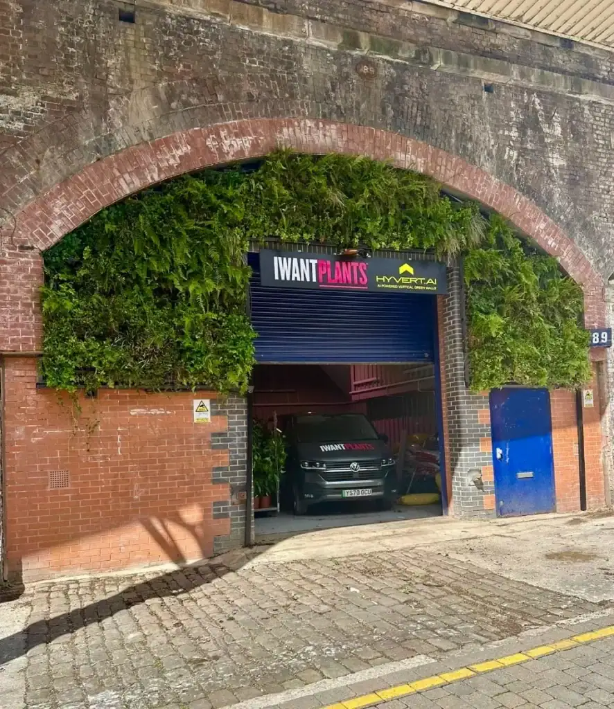 I Want Plants Service Hub in central manchester located under railway arch now enhanced by a HYVERT living wall installation around the entrance